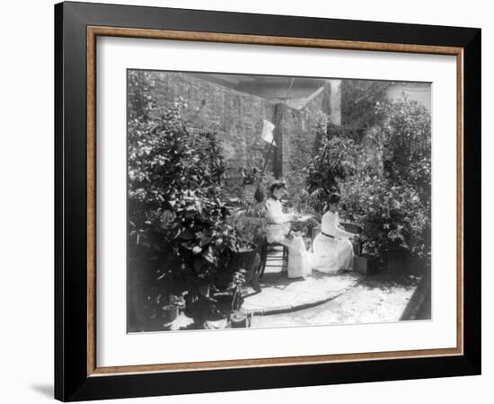 Two Women in their Garden in Cuba Photograph - Cuba-Lantern Press-Framed Art Print