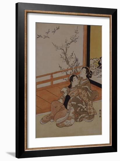 Two Women Seated by a Verandah, One Pointing at Geese in Flight Beyond a Flowering Plum Tree-Suzuki Harunobu-Framed Giclee Print