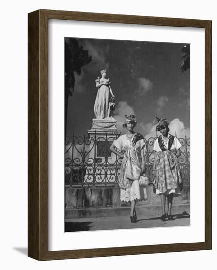 Two Women Standing in Front of a Statue of the Empress Josephine on the Island of Martinique-null-Framed Photographic Print