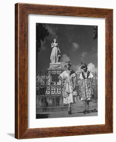 Two Women Standing in Front of a Statue of the Empress Josephine on the Island of Martinique-null-Framed Photographic Print