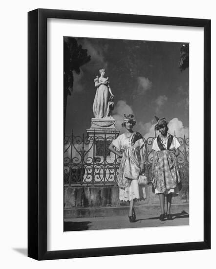 Two Women Standing in Front of a Statue of the Empress Josephine on the Island of Martinique-null-Framed Photographic Print