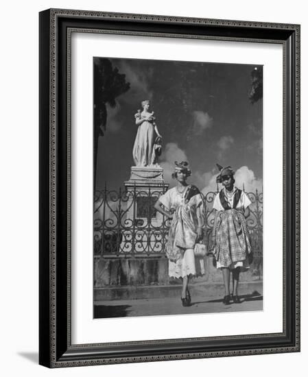Two Women Standing in Front of a Statue of the Empress Josephine on the Island of Martinique-null-Framed Photographic Print