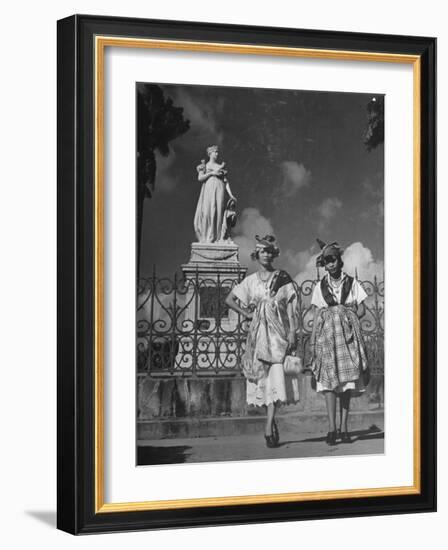 Two Women Standing in Front of a Statue of the Empress Josephine on the Island of Martinique-null-Framed Photographic Print