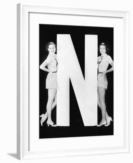 Two Women with Huge Letter N-Everett Collection-Framed Photographic Print