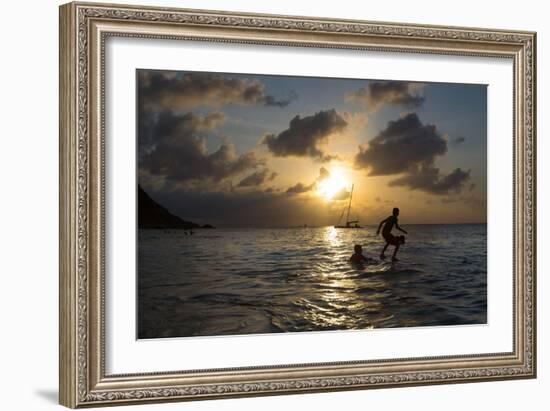 Two Young Boys Attempt to Surf on Praia Da Conceicao Beach at Sunset-Alex Saberi-Framed Photographic Print