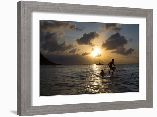 Two Young Boys Attempt to Surf on Praia Da Conceicao Beach at Sunset-Alex Saberi-Framed Photographic Print