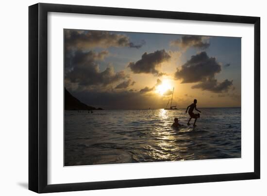 Two Young Boys Attempt to Surf on Praia Da Conceicao Beach at Sunset-Alex Saberi-Framed Photographic Print