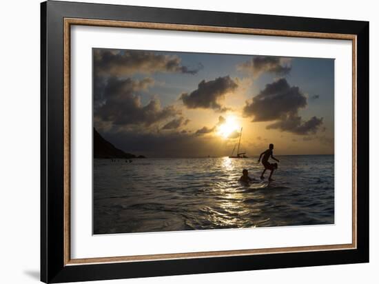 Two Young Boys Attempt to Surf on Praia Da Conceicao Beach at Sunset-Alex Saberi-Framed Photographic Print