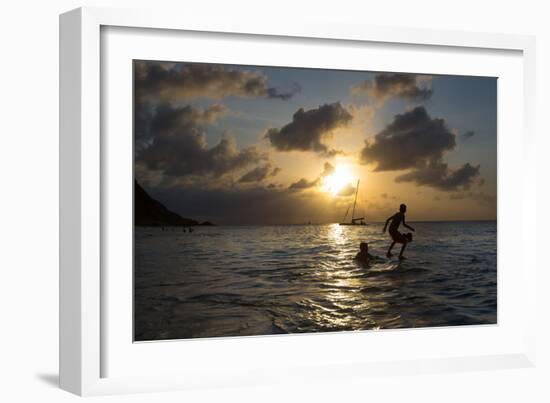 Two Young Boys Attempt to Surf on Praia Da Conceicao Beach at Sunset-Alex Saberi-Framed Photographic Print