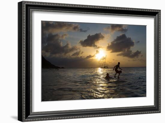 Two Young Boys Attempt to Surf on Praia Da Conceicao Beach at Sunset-Alex Saberi-Framed Photographic Print