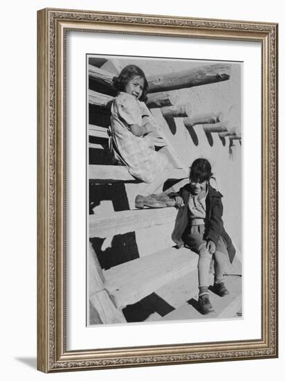 Two Young Girls Sitting On Steps. At San Ildefonso Pueblo New Mexico 1942." 1942-Ansel Adams-Framed Art Print