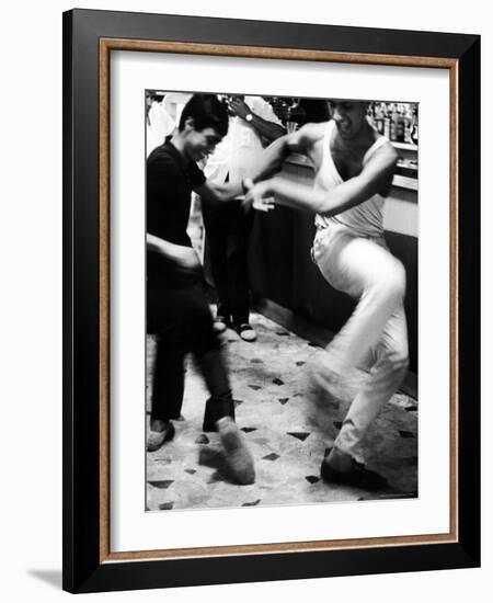 Two Young Italian Men Dancing to Music from a Jukebox in a Bar-Paul Schutzer-Framed Photographic Print