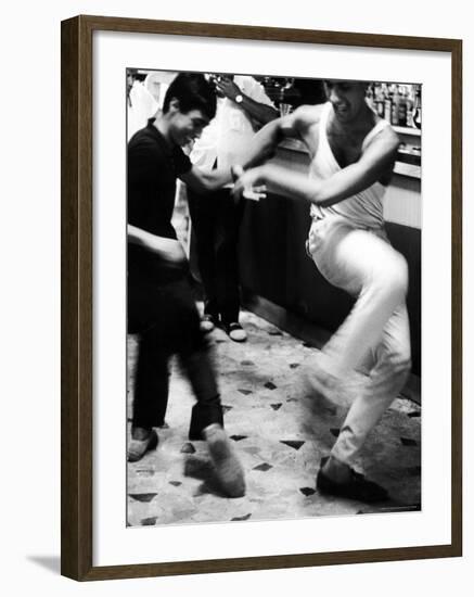 Two Young Italian Men Dancing to Music from a Jukebox in a Bar-Paul Schutzer-Framed Photographic Print