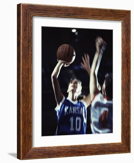 Two Young Women Playing Basketball-null-Framed Photographic Print