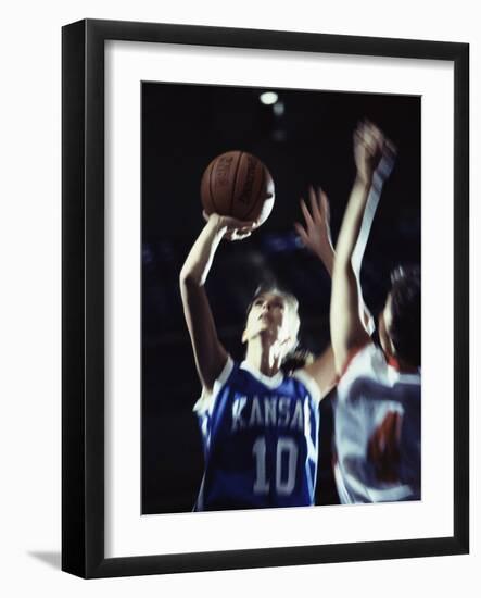 Two Young Women Playing Basketball-null-Framed Photographic Print