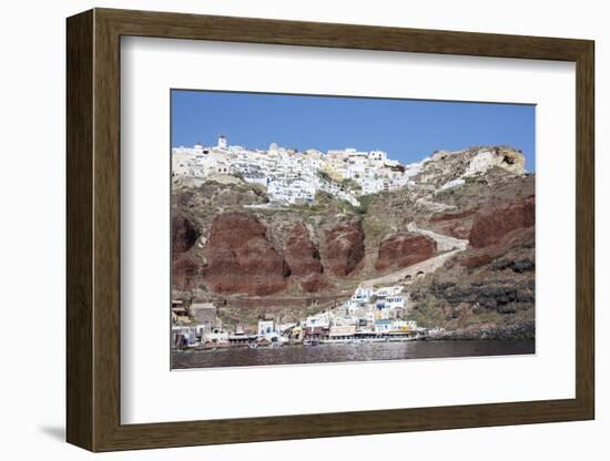 Typical Greek Village Perched on Volcanic Rock with White and Blue Houses and Windmills, Santorini-Roberto Moiola-Framed Photographic Print