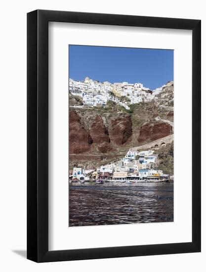 Typical Greek Village Perched on Volcanic Rock with White and Blue Houses and Windmills, Santorini-Roberto Moiola-Framed Photographic Print