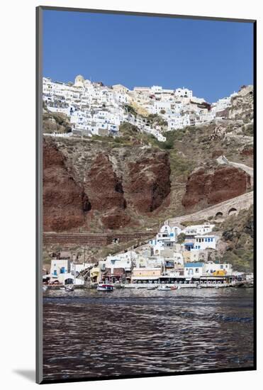 Typical Greek Village Perched on Volcanic Rock with White and Blue Houses and Windmills, Santorini-Roberto Moiola-Mounted Photographic Print