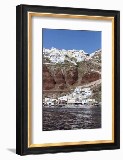 Typical Greek Village Perched on Volcanic Rock with White and Blue Houses and Windmills, Santorini-Roberto Moiola-Framed Photographic Print