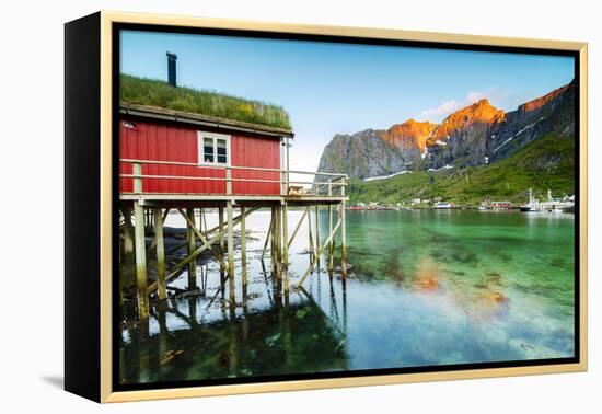 Typical House of Fishermen Called Rorbu Lit Up by Midnight Sun, Reine, Nordland County-Roberto Moiola-Framed Premier Image Canvas
