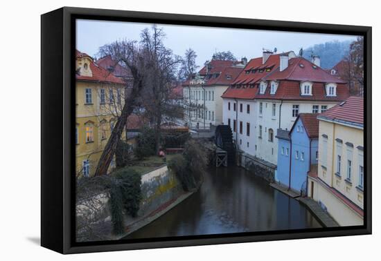 Typical houses on water canal frame the old mill of Certovka, Lesser Quarter, Prague, Czech Republi-Roberto Moiola-Framed Premier Image Canvas