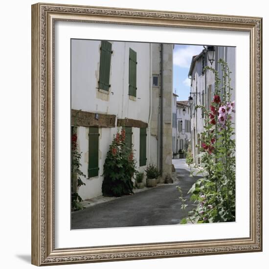 Typical Street Scene with Hollyhocks, St. Martin, Ile de Re, Poitou-Charentes, France, Europe-Stuart Black-Framed Photographic Print
