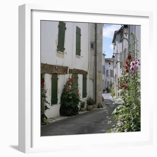 Typical Street Scene with Hollyhocks, St. Martin, Ile de Re, Poitou-Charentes, France, Europe-Stuart Black-Framed Photographic Print