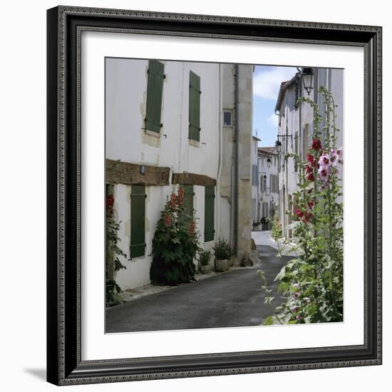 Typical Street Scene with Hollyhocks, St. Martin, Ile de Re, Poitou-Charentes, France, Europe-Stuart Black-Framed Photographic Print