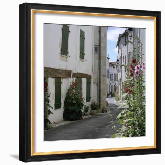 Typical Street Scene with Hollyhocks, St. Martin, Ile de Re, Poitou-Charentes, France, Europe-Stuart Black-Framed Photographic Print