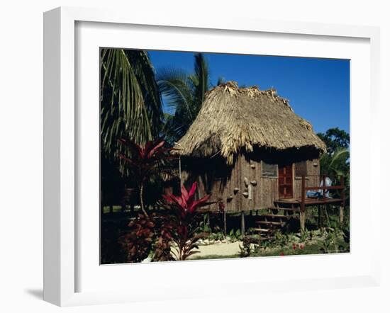Typical Thatched Wooden Hut on the Island, Caye Caulker, Belize, Central America-Christopher Rennie-Framed Photographic Print