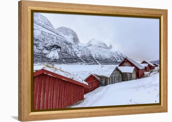 Typical Wooden Huts in the Snowy Landscape of Lyngseidet, Lyngen Alps, Tromso Lapland, Norway-Roberto Moiola-Framed Premier Image Canvas