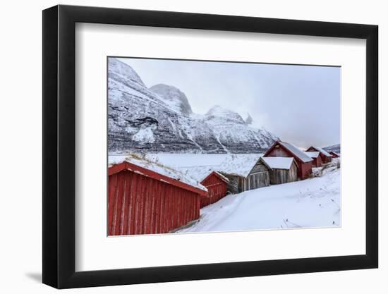 Typical Wooden Huts in the Snowy Landscape of Lyngseidet, Lyngen Alps, Tromso Lapland, Norway-Roberto Moiola-Framed Photographic Print