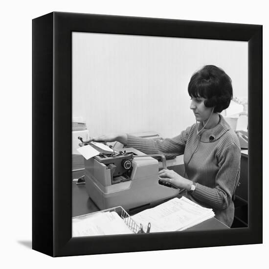 Typist, 1967-Michael Walters-Framed Premier Image Canvas