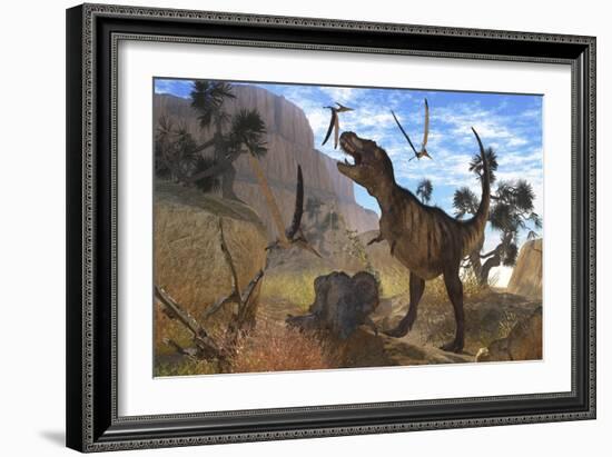 Tyrannosaurus Rex Attempts to Eat His Triceratops Kill While Pteranodons Harass Him-null-Framed Art Print