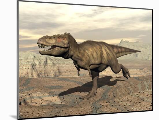 Tyrannosaurus Rex Dinosaur Running across Rocky Terrain-null-Mounted Art Print