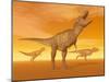 Tyrannosaurus Rex Dinosaurs in an Orange Foggy Desert by Sunset-null-Mounted Art Print