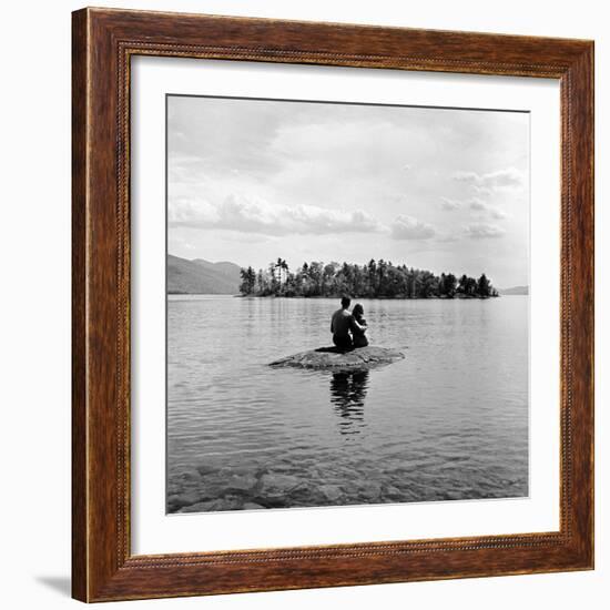 Young Couple Embracing on Small Rock Protruding from the Waters of Lake George-Nina Leen-Framed Photographic Print