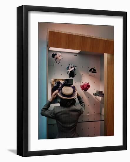 Woman Trying on Hats-Alfred Eisenstaedt-Framed Photographic Print