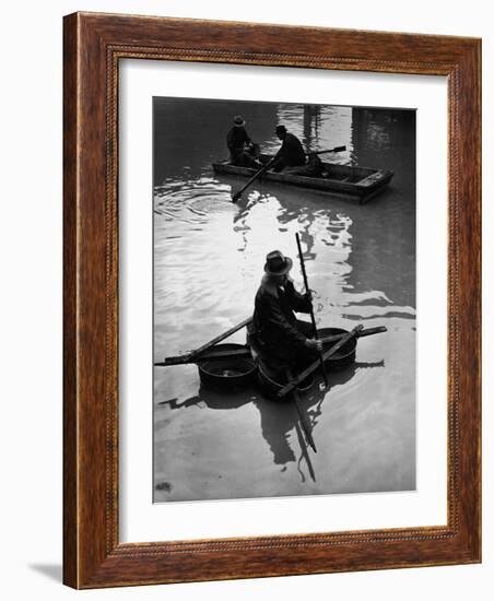 Flood Victim Paddling Boat Fashioned Out of Four Washtubs in the Flood Waters of Mississippi River-Margaret Bourke-White-Framed Photographic Print