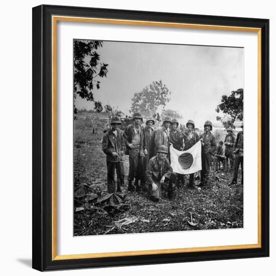 US Marines Holding Japanese Flag Captured During First Days of the Saipan Offensive-Peter Stackpole-Framed Photographic Print