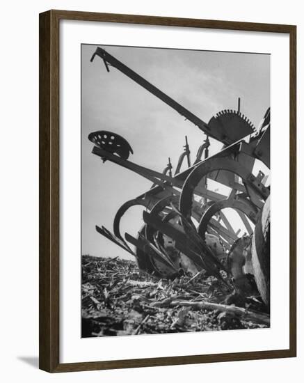 A Farmer's Harrow Digging into it the Ground-null-Framed Photographic Print