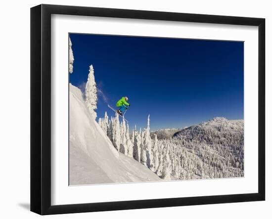 Jumping from Cliff on a Sunny Day at Whitefish Mountain Resort, Montana, Usa-Chuck Haney-Framed Photographic Print