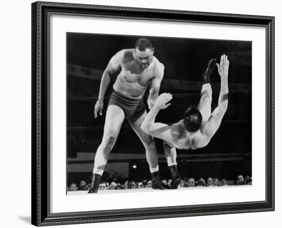 Joe Louis Throws Jim Bernard to the Mat During a 1956 Wrestling Match in Detroit-null-Framed Photo