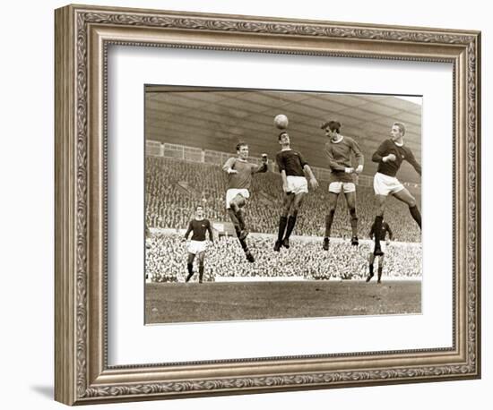 Manchester United vs. Arsenal, Football Match at Old Trafford, October 1967-null-Framed Photographic Print