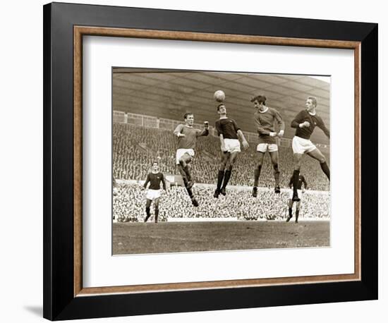 Manchester United vs. Arsenal, Football Match at Old Trafford, October 1967-null-Framed Photographic Print