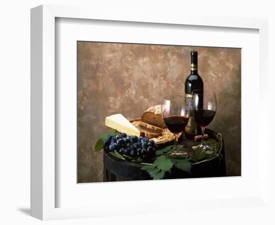 Still Life of Wine Bottle, Wine Glasses, Cheese and Purple Grapes on Top of Barrel-null-Framed Photographic Print