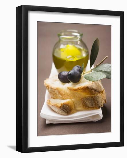 Olive Sprig with Black Olives on White Bread, Olive Oil Behind-null-Framed Photographic Print