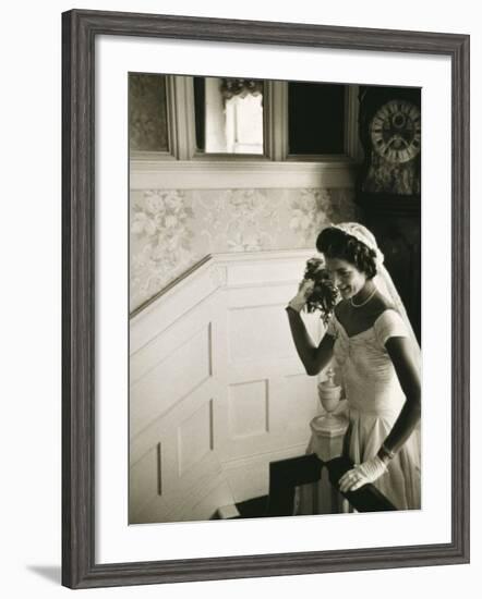 Jackie Kennedy Throwing the Bouquet-Toni Frissell-Framed Photo