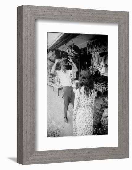 U.S Cpl. James C. Farley of Yankee Papa 13 Trying on Bush Hats, Danang, Vietnam 1965-Larry Burrows-Framed Photographic Print