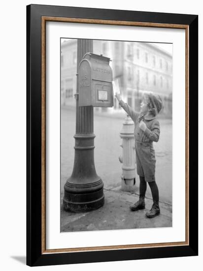 Boy Mailing Letter, Early 1900s-Marvin Boland-Framed Giclee Print